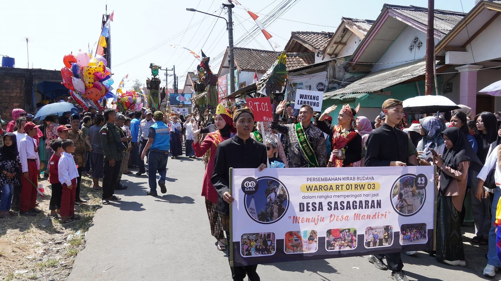 KIRAB BUDAYA HARI JADI DESA SASAGARAN, BUPATI MARWAN APRESIASI KEKOMPAKAN MASYARAKAT 1 458976299 902878455207327 2818287606123547437 n
