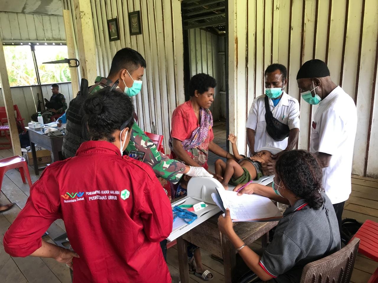 Bersinergi Tingkatkan Kualitas Kesehatan Di Perbatasan RI-PNG, Satgas Yonif 310/KK Gelar Posyandu 1 WhatsApp Image 2024 09 05 at 07.42.10